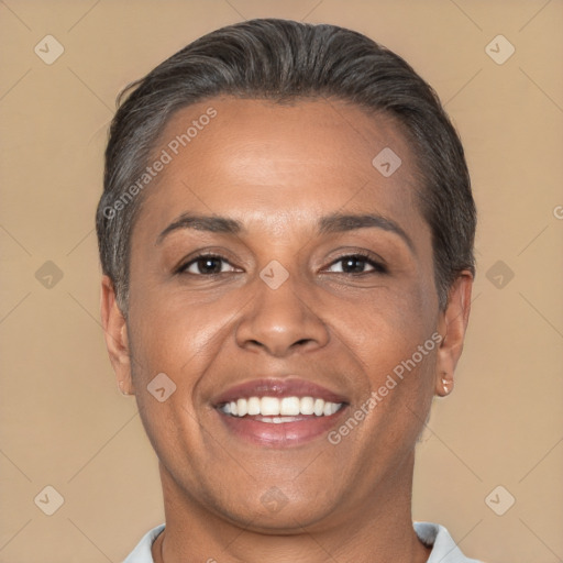 Joyful white adult female with short  brown hair and brown eyes