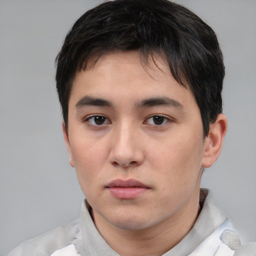 Neutral white young-adult male with short  black hair and brown eyes