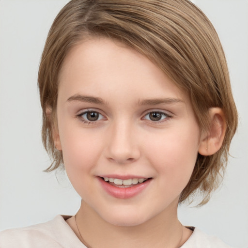 Joyful white child female with medium  brown hair and brown eyes