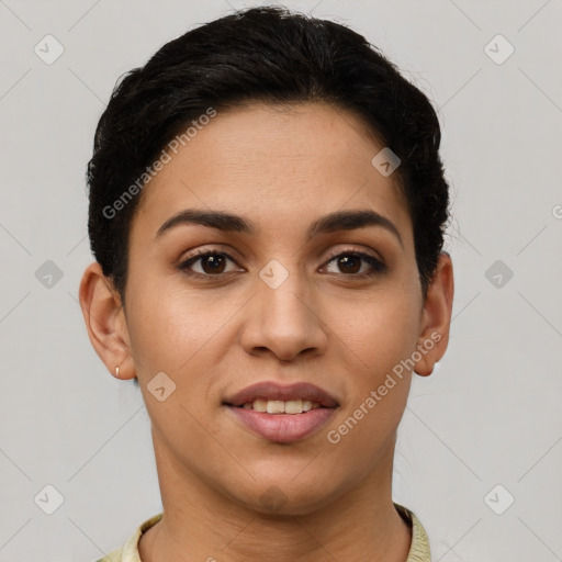 Joyful latino young-adult female with short  brown hair and brown eyes