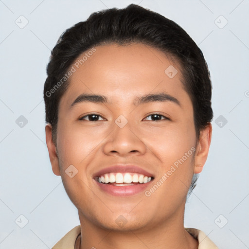 Joyful latino young-adult male with short  black hair and brown eyes