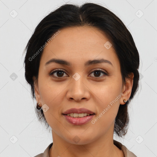 Joyful latino young-adult female with medium  black hair and brown eyes