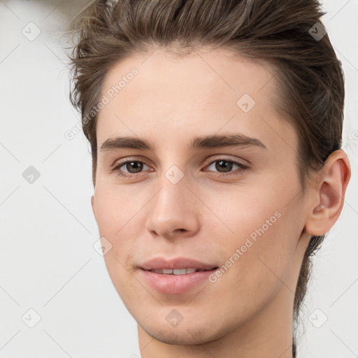 Joyful white young-adult female with short  brown hair and brown eyes