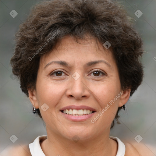 Joyful white adult female with short  brown hair and brown eyes