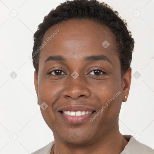 Joyful black young-adult male with short  brown hair and brown eyes