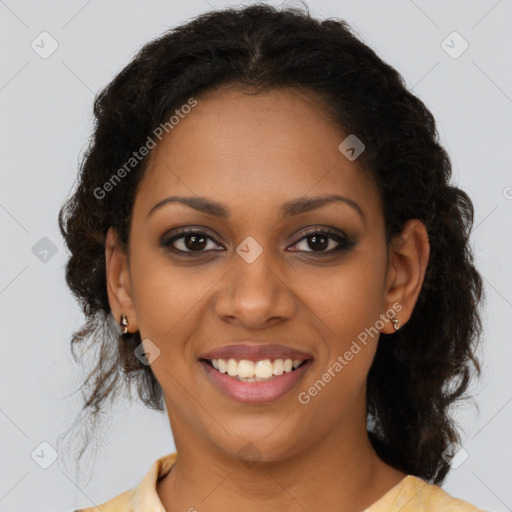 Joyful black young-adult female with medium  brown hair and brown eyes