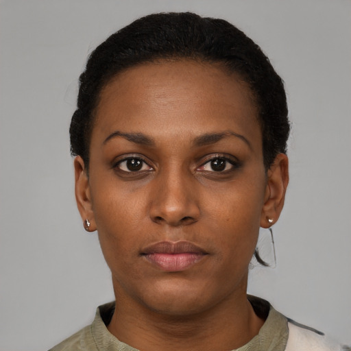 Neutral black young-adult female with short  black hair and brown eyes