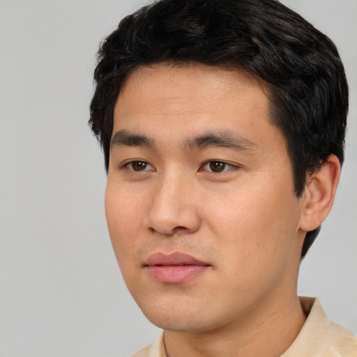 Neutral asian young-adult male with short  black hair and brown eyes