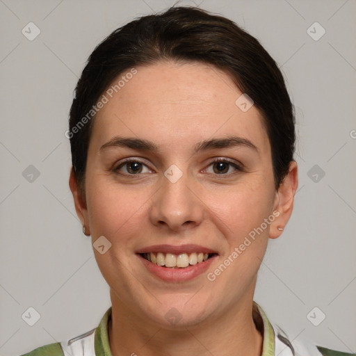 Joyful white young-adult female with medium  brown hair and grey eyes