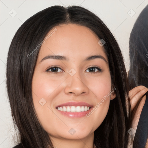 Joyful white young-adult female with long  black hair and brown eyes