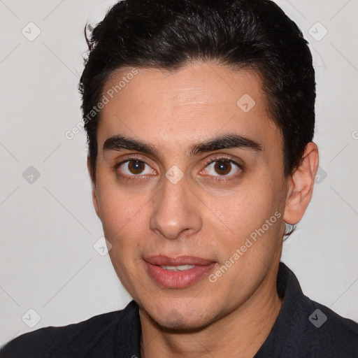 Joyful white young-adult male with short  brown hair and brown eyes