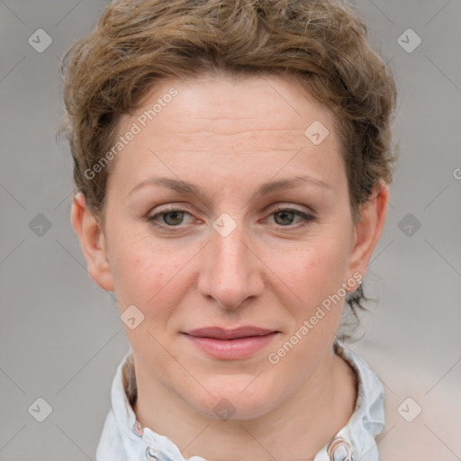 Joyful white adult female with short  brown hair and grey eyes