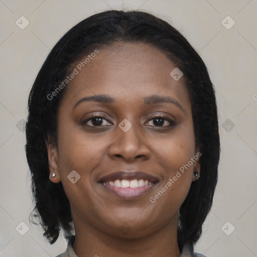 Joyful black young-adult female with medium  brown hair and brown eyes