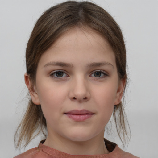 Joyful white child female with medium  brown hair and brown eyes