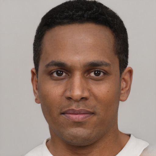 Neutral black young-adult male with short  black hair and brown eyes