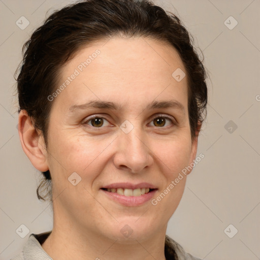 Joyful white adult female with short  brown hair and brown eyes