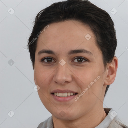 Joyful white young-adult female with short  brown hair and brown eyes