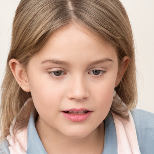 Joyful white child female with medium  brown hair and grey eyes