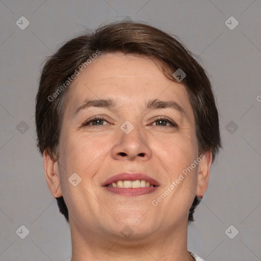 Joyful white adult female with short  brown hair and brown eyes