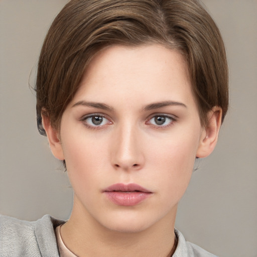 Neutral white young-adult female with short  brown hair and grey eyes