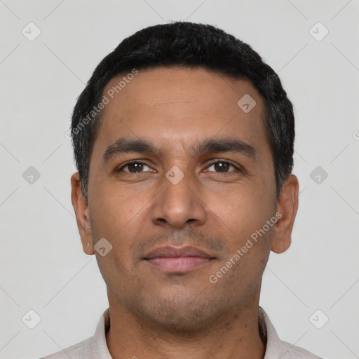 Neutral latino young-adult male with short  black hair and brown eyes