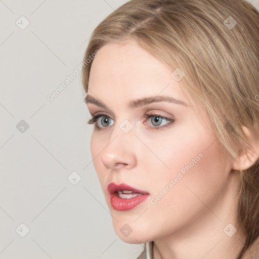 Neutral white young-adult female with long  brown hair and grey eyes