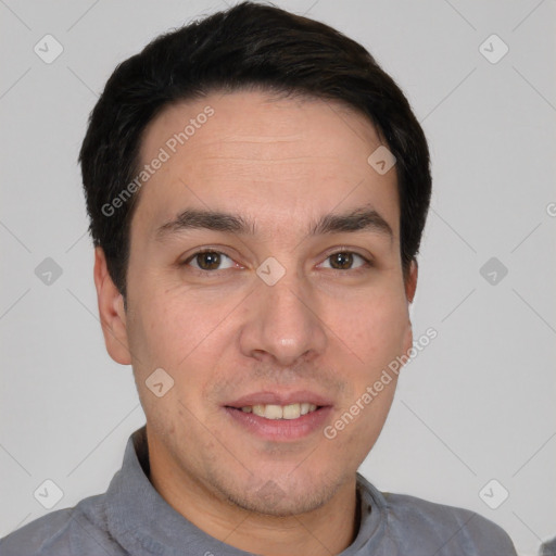 Joyful white young-adult male with short  black hair and brown eyes