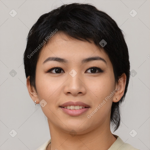 Joyful asian young-adult female with medium  black hair and brown eyes