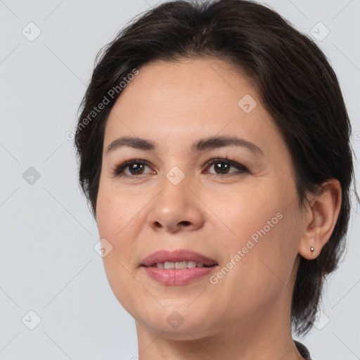 Joyful white young-adult female with medium  brown hair and brown eyes