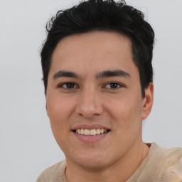 Joyful latino young-adult male with short  brown hair and brown eyes