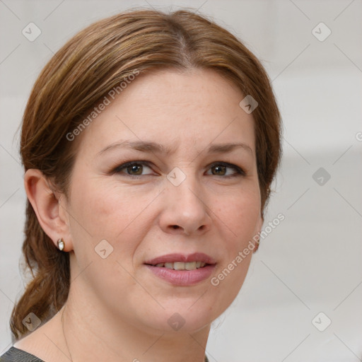 Joyful white adult female with medium  brown hair and grey eyes