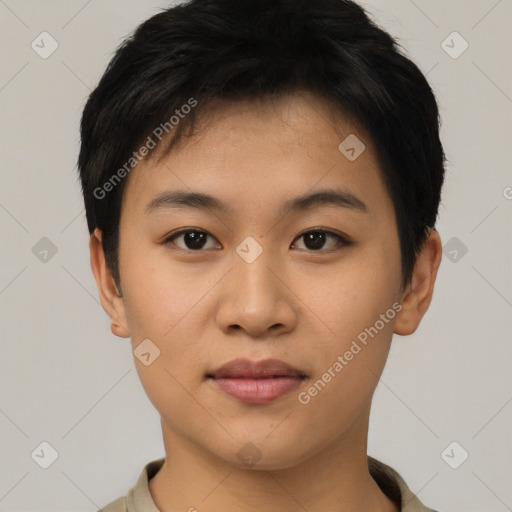 Joyful asian young-adult female with short  black hair and brown eyes