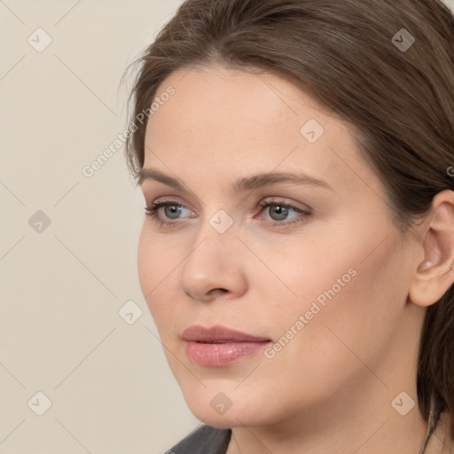 Neutral white young-adult female with medium  brown hair and brown eyes