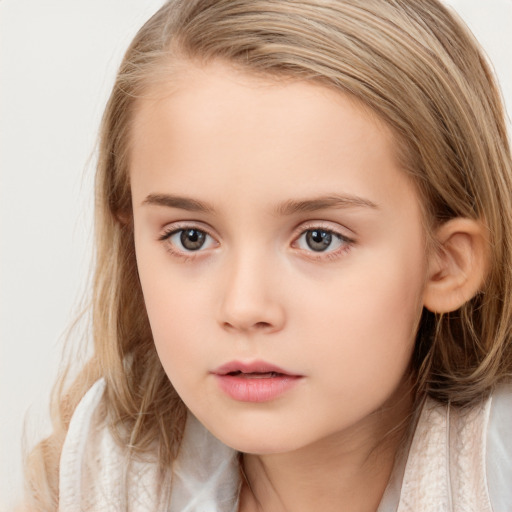 Neutral white child female with long  brown hair and blue eyes