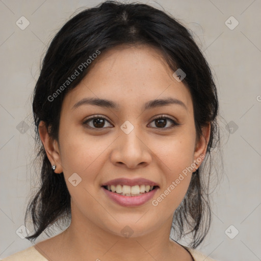 Joyful latino young-adult female with medium  brown hair and brown eyes