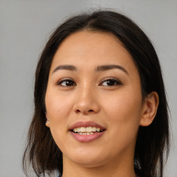 Joyful asian young-adult female with medium  brown hair and brown eyes