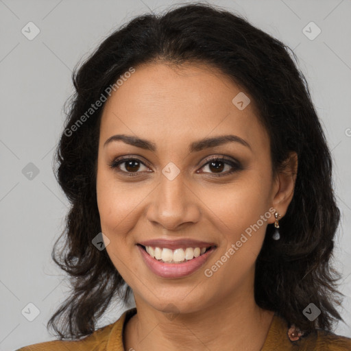 Joyful latino young-adult female with long  brown hair and brown eyes