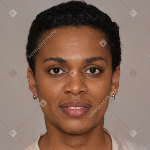 Joyful black young-adult female with short  brown hair and brown eyes