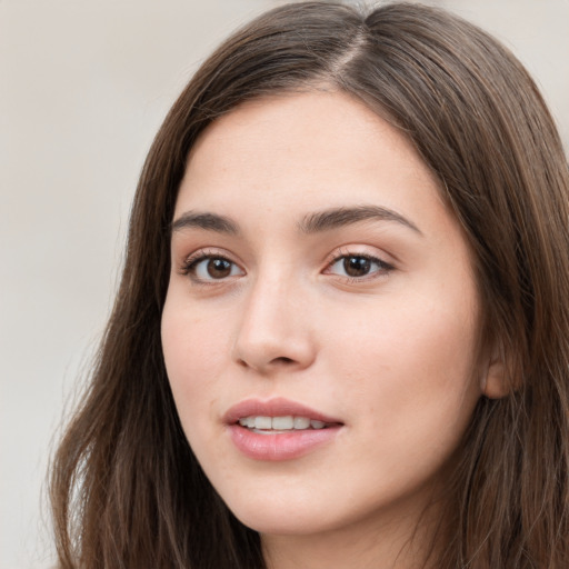 Neutral white young-adult female with long  brown hair and brown eyes