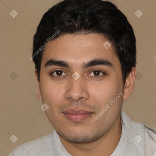 Joyful latino young-adult male with short  black hair and brown eyes
