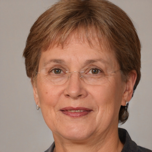 Joyful white middle-aged female with medium  brown hair and brown eyes