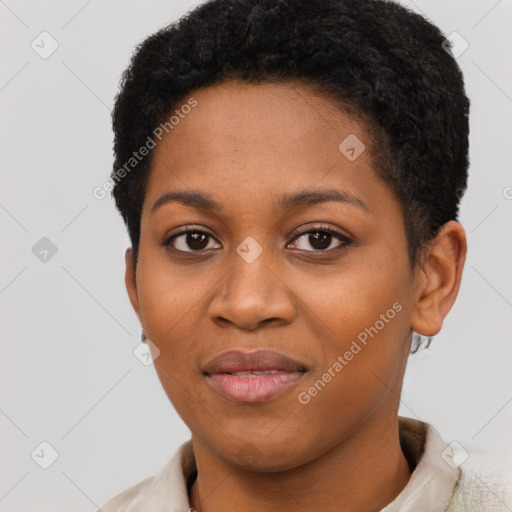 Joyful black young-adult female with short  black hair and brown eyes