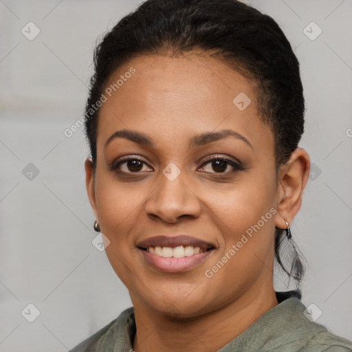 Joyful latino young-adult female with short  black hair and brown eyes