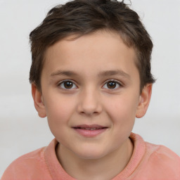 Joyful white child female with short  brown hair and brown eyes