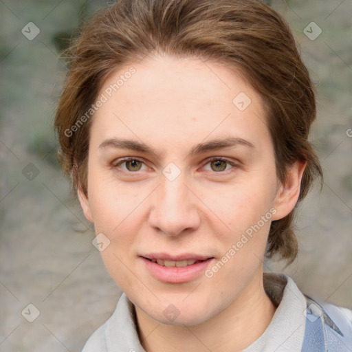 Joyful white young-adult female with medium  brown hair and green eyes