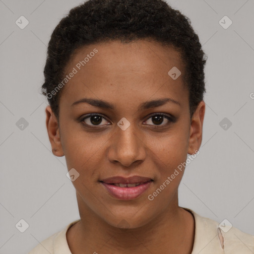 Joyful black young-adult female with short  brown hair and brown eyes