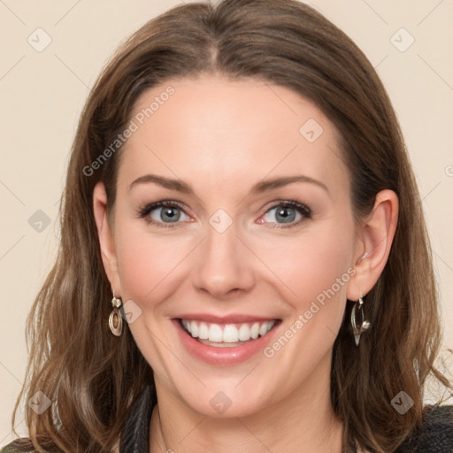 Joyful white young-adult female with long  brown hair and blue eyes