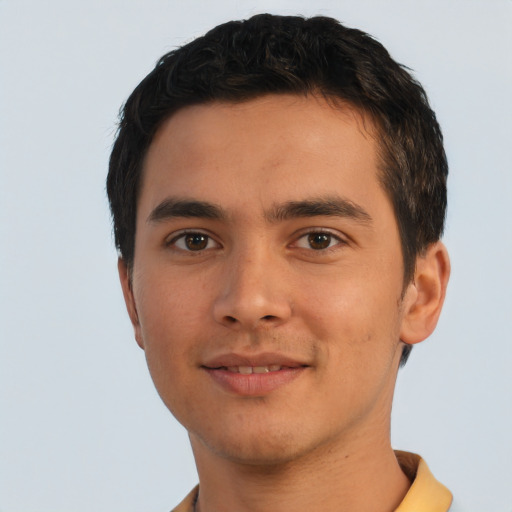 Joyful asian young-adult male with short  black hair and brown eyes