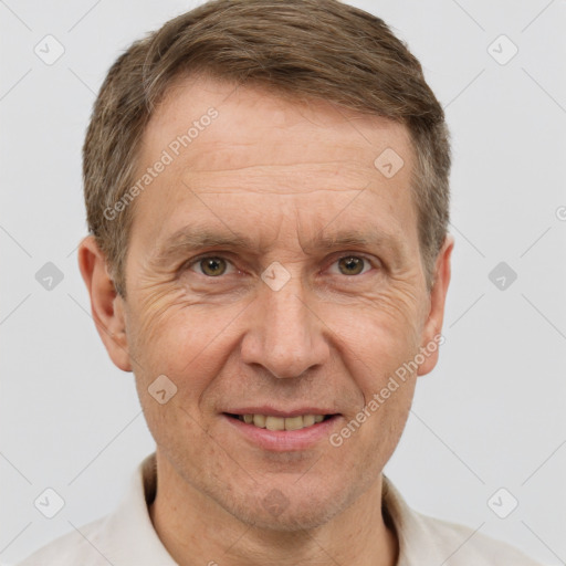 Joyful white middle-aged male with short  brown hair and brown eyes