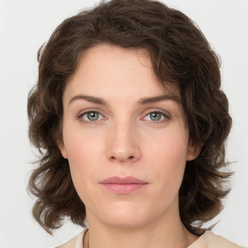 Neutral white young-adult female with medium  brown hair and green eyes